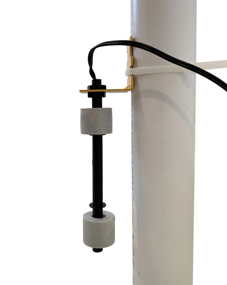 Pump switch mounted to pipe