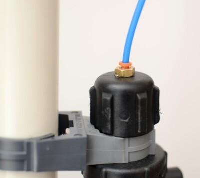 Tube fittings on float